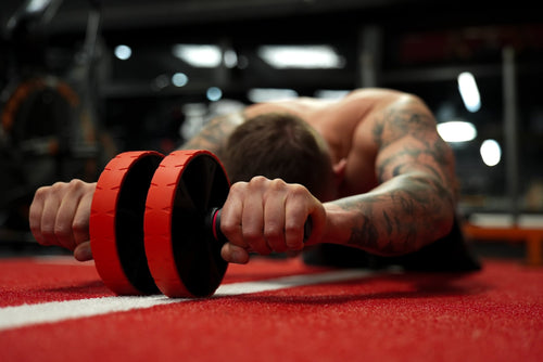 red and black ab roller for core workout